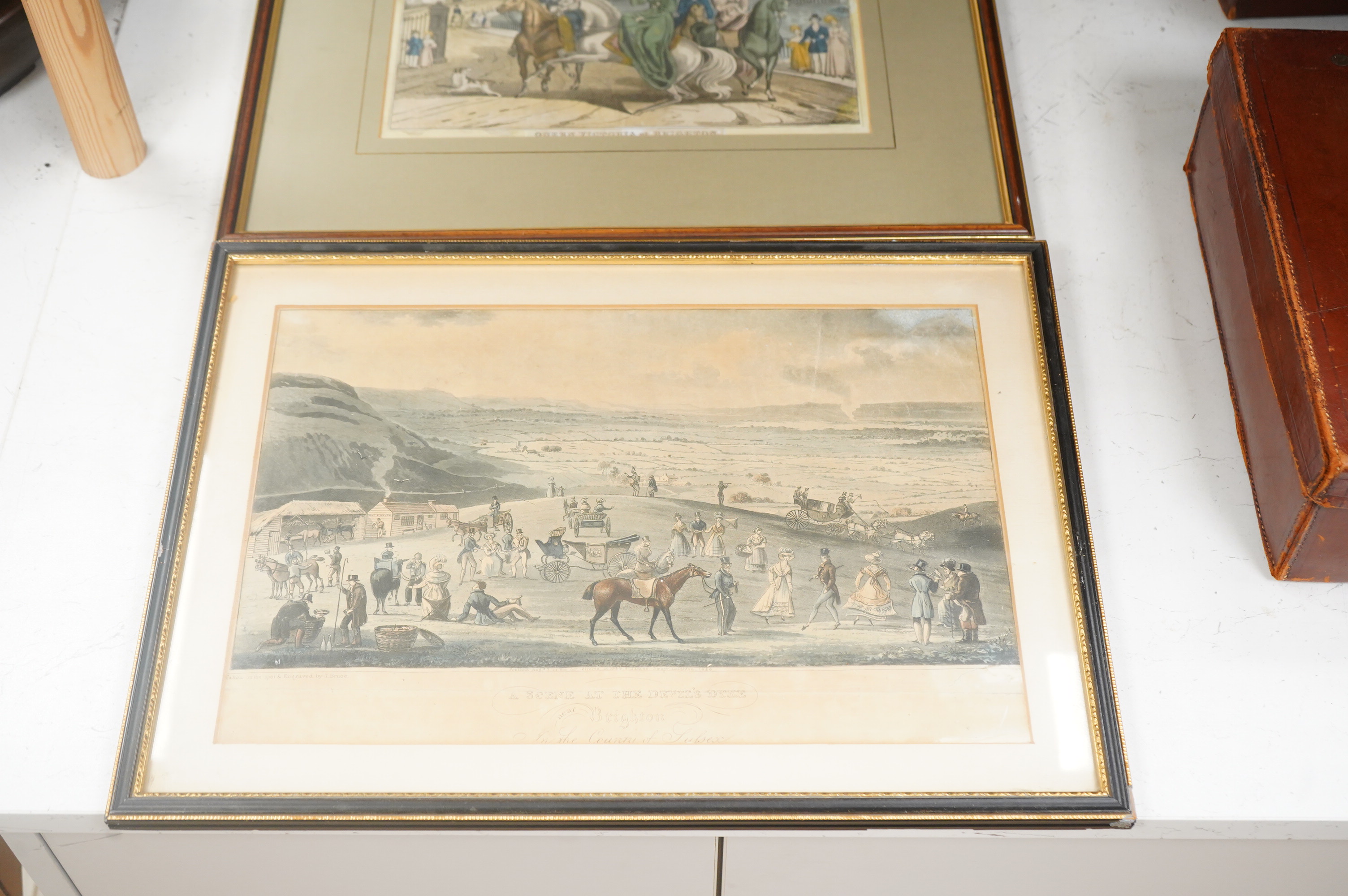 Three Brighton interest prints, 19th century, to include: The King and Queen's first entry into Brighton through the Royal Arch, 1830, published and sold by W Belch at Brighton, largest 27 x 39cm
